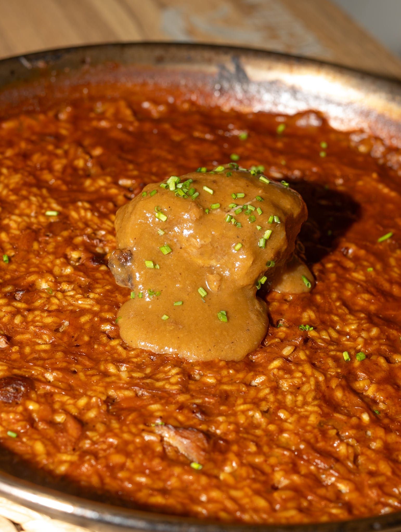 Arroz de carrilleras al vino dulce de Málaga — La Quisquillosa Playa